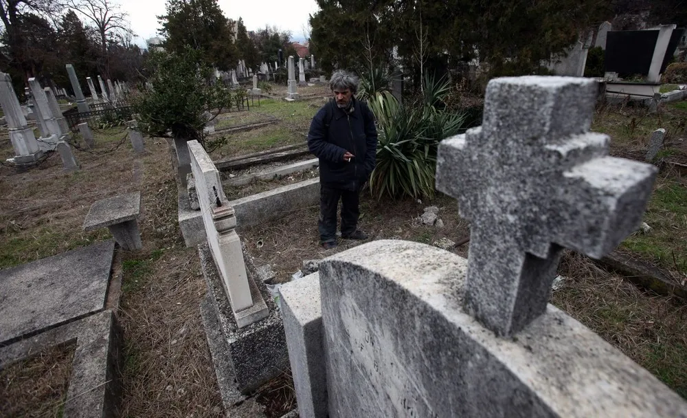 Bratislav Stojanovic: Guys Lives in Cemetery in Serbia 