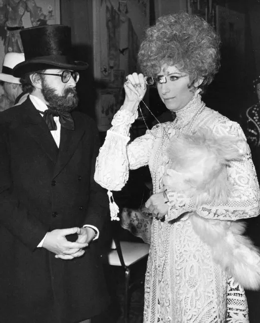 Actress Barbra Streisand and her manager, Marty Erlichman, show up in old fashioned costumes at a party in Hollywood, Calif. on January 3, 1969. (Photo by Ed Widdis/AP Photo)