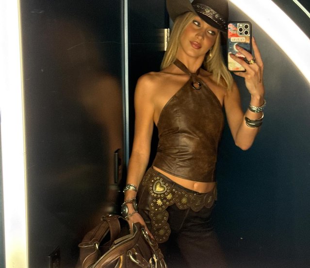 American model Bella Hadid on August 17, 2025 channels her inner cowgirl in a stylish mirror snap. (Photo by bellahadid/Instagram)