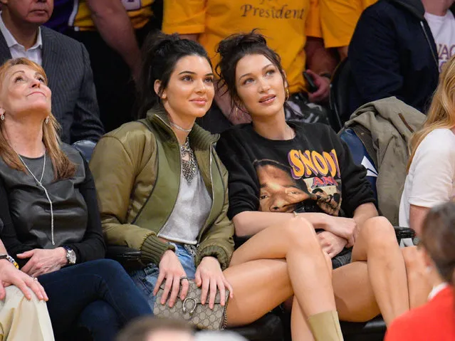 Kendall Jenner (L) and Bella Hadid attend a basketball game between the Dallas Mavericks and the Los Angeles Lakers at Staples Center on November 8, 2016 in Los Angeles, California. (Photo by Noel Vasquez/GC Images)