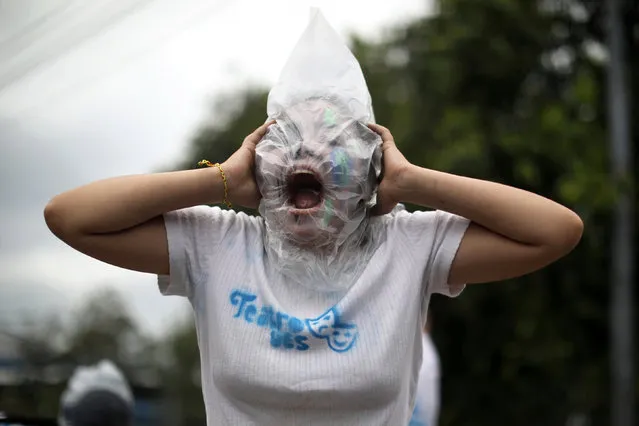 A performer participates in a protest against privatisation of water in San Salvador, El Salvador July 5, 2018. (Photo by Jose Cabezas/Reuters)