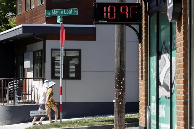 A digital sign shows a temperature of 109 degrees Fahrenheit during the scorching weather of a heatwave in Seattle, Washington, U.S. June 28, 2021. (Photo by Jason Redmond/Reuters)