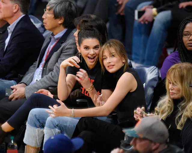 Kendall Jenner (L) and Hailey Baldwin attend a basketball game between the Memphis Grizzlies and the Los Angeles Lakers at Staples Center on January 3, 2017 in Los Angeles, California. (Photo by Noel Vasquez/Getty Images)