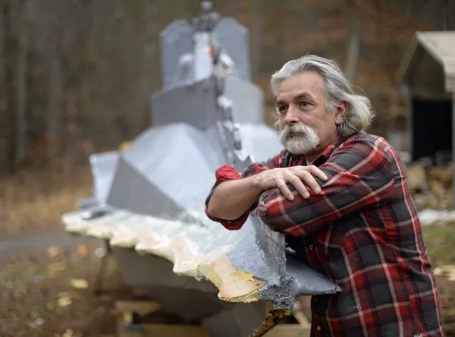 Danny McWilliams, 56, is seen at his 36-foot-long replica of Walt Disney movie version of the Nautilus submarine from Jules Verne's “20,000 Leagues Under the Sea” at his rural home in Ellijay, Georgia, USA, 04 December 2013. (Photo by Erik S. Lesser/EPA)