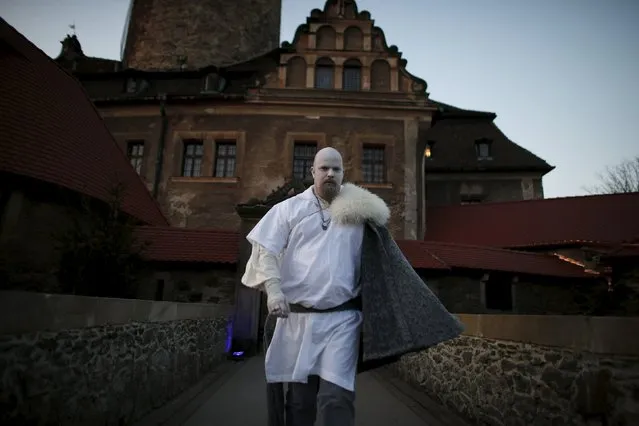 A participant walks in front of the castle before the role play event at Czocha Castle in Sucha, west southern Poland April 9, 2015. (Photo by Kacper Pempel/Reuters)