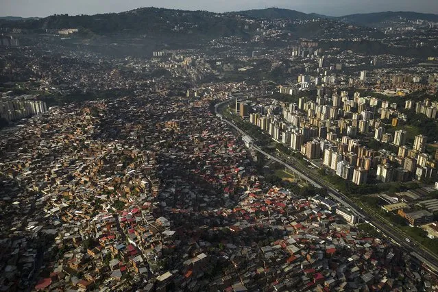 Homes cover a hill in the Petare neighborhood of Caracas, Venezuela, Monday, October 2, 2023. (Phoot by Matias Delacroix/AP Photo)