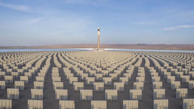 A part view of a Molten Salt Tower Solar Thermal Power Station is seen on June 02, 2023 in Jiuquan, China. (Photo by Hu Chengwei/Getty Images)