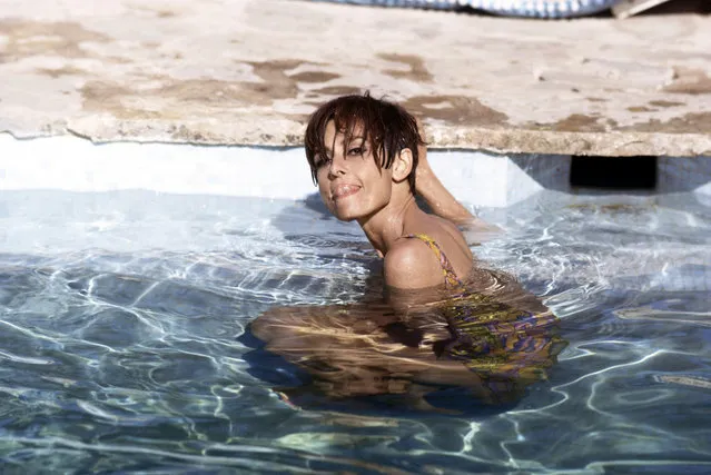 Audrey Hepburn, 1967. In this rare shot of Audrey Hepburn, Hollywood's brightest star takes a dip in the pool during a break from filming Stanley Donen's film “Two For The Road” in 1967. (Photo by Terry O'Neill)