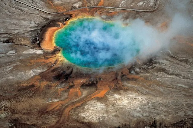 Yellowstone National Park’s Grand Prismatic hot spring is pictured in this undated handout photo obtained by Reuters April 23, 2015. The hot springs are among the park’s hydrothermal features created by the fact that Yellowstone is a supervolcano – the largest type of volcano on Earth. (Photo by Robert B. Smith/Lee J. Siegel/Reuters)