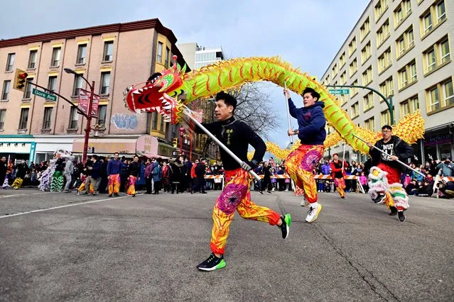 People attend the annual Chinatown Spring Festival Parade, as it returned after being cancelled two years in a row due to the coronavirus disease (COVID-19) pandemic, amid Lunar New Year celebrations, in Vancouver, British Columbia, Canada on January 22, 2023. (Photo by Jennifer Gauthier/Reuters)