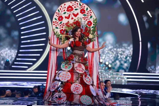 Miss Ukraine, Anna Neplyakh, appears on stage during the national costume presentation of the 70th Miss Universe beauty pageant in Israel's southern Red Sea coastal city of Eilat on December 10, 2021. (Photo by Menahem Kahana/AFP Photo)