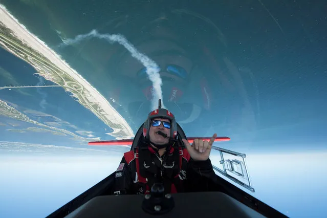 Aerobatic pilot John Klatt takes to the skies for practice ahead of the Bethpage Air Show as part of a Memorial Day event at Jones Beach on Long Island, New York, U.S., May 24, 2019. (Photo by Johnny Milano/Reuters)