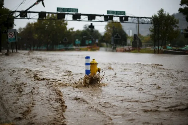 View of a flooded street in Santiago, April 17, 2016. (Photo by Ivan Alvarado/Reuters)