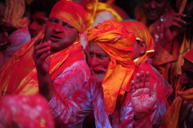 A Hindu devotee takes part in Laddu maar Holi at “Radha Rani Temple” at Barsana, Mathura in India on March 6, 2017. (Photo by Prabhat Kumar Verma/Pacific Press/LightRocket via Getty Images)