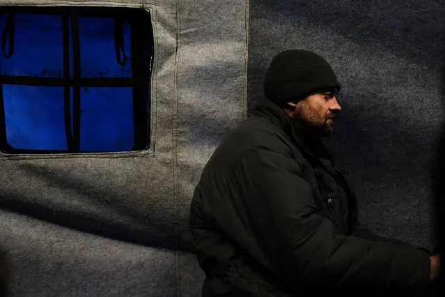 A homeless man rests at a clinic which helps Moscow's disadvantaged on March 7, 2017 in Moscow, Russia. The clinic, which is run by the group Mercy and is partly supported by the Orthodox church, helps homeless individuals with health care, shelter, and acquiring needed documents to work. Some charities estimate there are now more than 100,000 people living on the street in Moscow as the economy continues to suffer. (Photo by Spencer Platt/Getty Images)