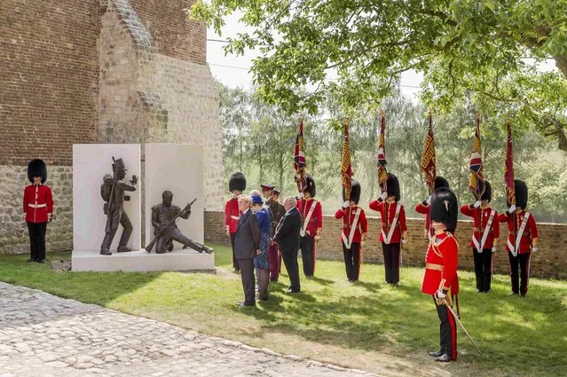 General view after Britain's Prince Charles (hidden) unveiled a monument during a ceremony for the opening of the Hougoumont farm as part of the bicentennial celebrations for the Battle of Waterloo, near Waterloo, Belgium June 17, 2015. The commemorations for the 200th anniversary of the Battle of Waterloo will take place in Belgium on June 19 and 20. REUTERS/Geert Vanden Wijngaert/Pool