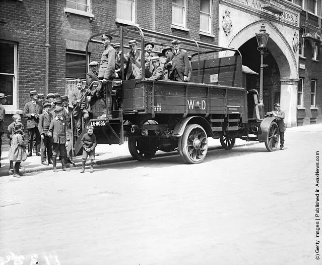 1919: Passengers aboard the new London lorry bus
