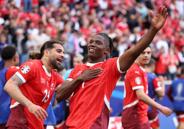 Breel Embolo of Switzerland celebrates scoring his team's third goal during the UEFA EURO 2024 group stage match between Hungary and Switzerland at Cologne Stadium on June 15, 2024 in Cologne, Germany. (Photo by Alex Grimm/Getty Images)