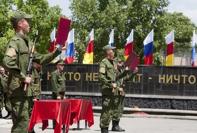 Servicemen of the military forces of South Ossetia attend an oath of allegiance ceremony in Tskhinvali, the capital of the breakaway region of South Ossetia, Georgia, July 5, 2015. (Photo by Kazbek Basaev/Reuters)