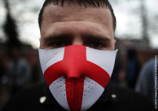 Members of the English Defence League (EDL) take part in a demonstration through the streets of Leicester