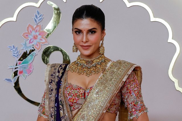 Sri Lankan actress and model Jacqueline Fernandez poses for pictures on the red carpet on the day of the wedding of Anant Ambani and Radhika Merchant in Mumbai, India, on July 12, 2024. (Photo by Francis Mascarenhas/Reuters)