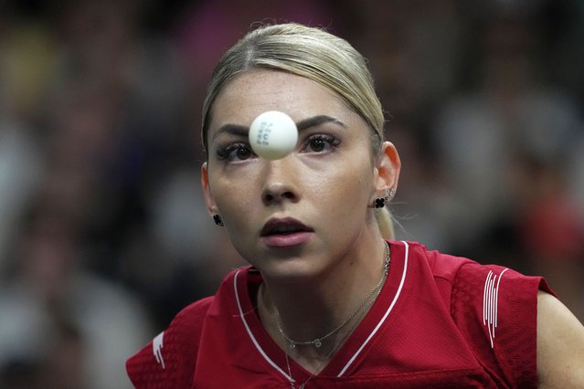 Romania's Bernadette Szocsplays against Austria's Sofia Polcanova during a women's singles round of 16 table tennis game at the 2024 Summer Olympics, Wednesday, July 31, 2024, in Paris, France. (Photo by Petros Giannakouris/AP Photo)