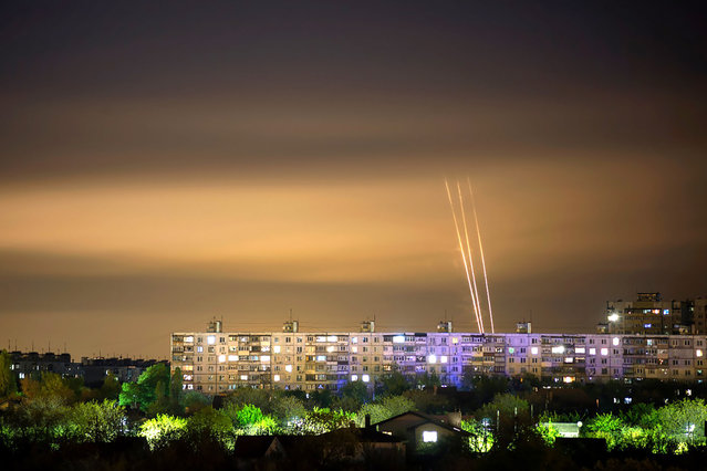 Russian rockets launch against Ukraine from Russia's Belgorod region, at dawn in Kharkiv, Ukraine, Monday, May 8, 2023. (Photo by Vadim Belikov/AP Photo)