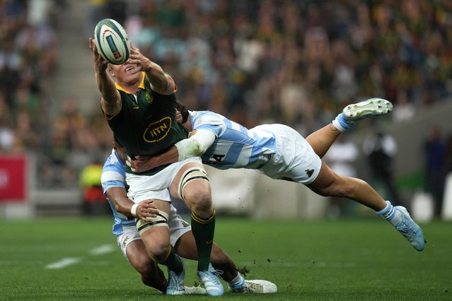 South Africa's Pieter-Steph du Toit, left, is tackled by Argentina's Rodrigo Isgro during a rugby championship test match at Mbombela stadium in Nelspruit, South Africa, Saturday, September 28, 2024. (Photo by Themba Hadebe/AP Photo)