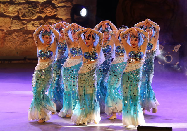 Members of Ningxia Performing Arts Group perform during the 57th edition of the International Festival of Carthage, at the Roman Theater of Carthage, in Tunis, Tunisia on August 9, 2023. (Photo by Mohamed Messara/EPA)