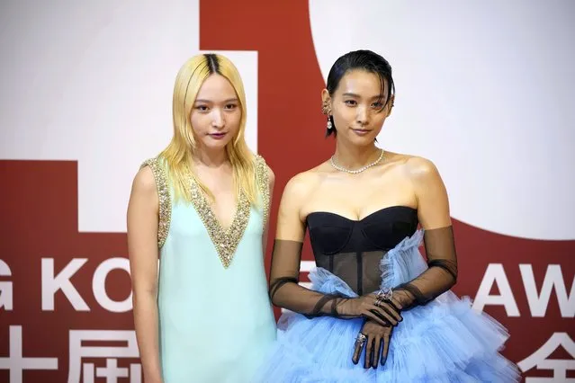 Hong Kong actresses Hedwig Tam, right, and Hanna Chan pose on red carpet at the Hong Kong Film Awards, Sunday, July 17, 2022. (Photo by Kin Cheung/AP Photo)