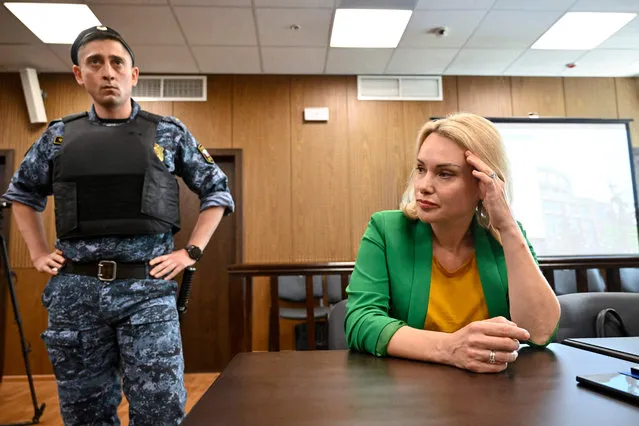Marina Ovsyannikova, the journalist who became known internationally after protesting against the Russian military action in Ukraine during a prime-time news broadcast on state television, appears in court accused of “discrediting” the Russian army fighting in Ukraine over her remarks outside a Moscow court earlier this month in support of opposition activist Ilya Yashin, in Moscow on July 28, 2022. (Photo by Alexander Nemenov/AFP Photo)