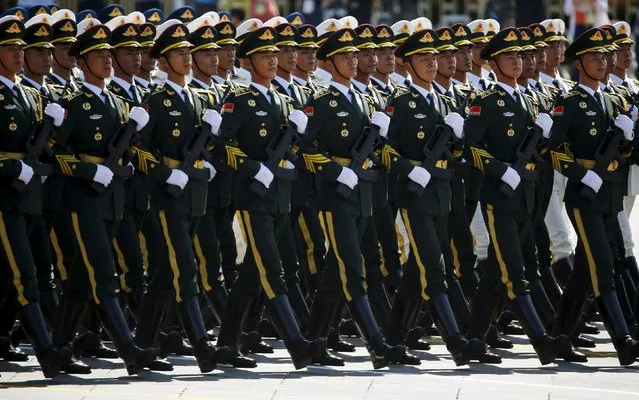 Soldiers of China's People's Liberation Army (PLA) march during the military parade to mark the 70th anniversary of the end of World War Two, in Beijing, China, September 3, 2015. (Photo by Damir Sagolj/Reuters)