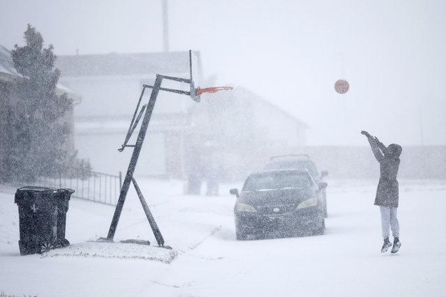 A boy plays basketball in the Gentilly neighborhood during Winter Storm Enzo on January 21, 2025 in New Orleans, Louisiana. New Orleans recieved as much as 10 inches of snow through out the metro area. (Photo by Sean Gardner/Getty Images)