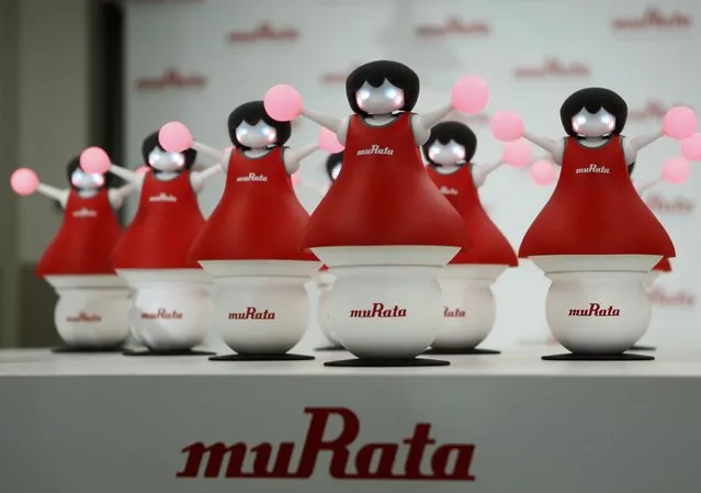 Japan's Murata Manufacturing Co. Ltd's latest concept robots, “The Murata Cheerleaders”, which balance on balls and synchronize as a team by utilizing its latest sensing and communication technology, are displayed during an unveiling event in Tokyo September 25, 2014. (Photo by Yuya Shino/Reuters)