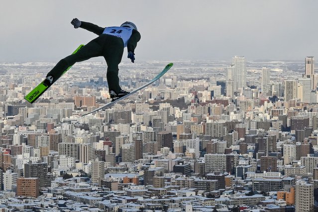 Danil Vassilyev of Kazakhstan takes part in a training run before the start of the qualifying round for the men's FIS Ski Jumping World Cup competition in Sapporo on February 14, 2025. (Photo by Richard A. Brooks/AFP Photo)