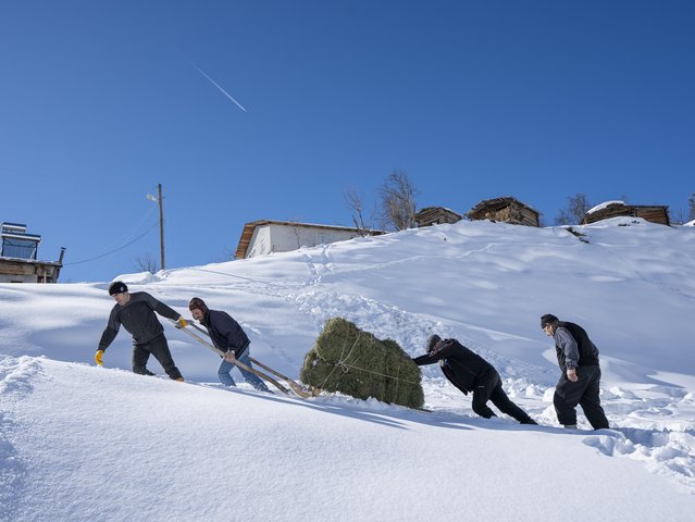 A view of the snow covered Maden village, which is famous for traditional wooden houses in Savsat district of Artvin, Turkiye on February 10, 2025. Although the roads reaching the village are open in the region where the winter season is harsh, the houses are reached on foot. Citizens living in the region, where the snow thickness exceeds 2 metres in places, make their living by agriculture and animal husbandry. (Photo by Umut Can Karahasanoglu/Anadolu via Getty Images)