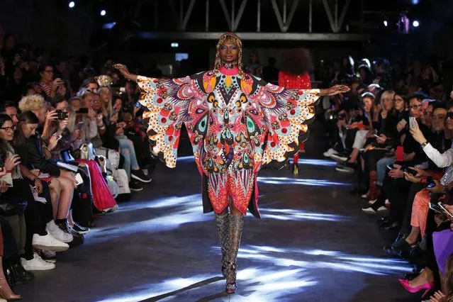 A model presents a creation by Indian designer Manish Arora as part of his Spring/Summer 2016 women's ready-to-wear fashion show in Paris, France, October 1, 2015. (Photo by Benoit Tessier/Reuters)