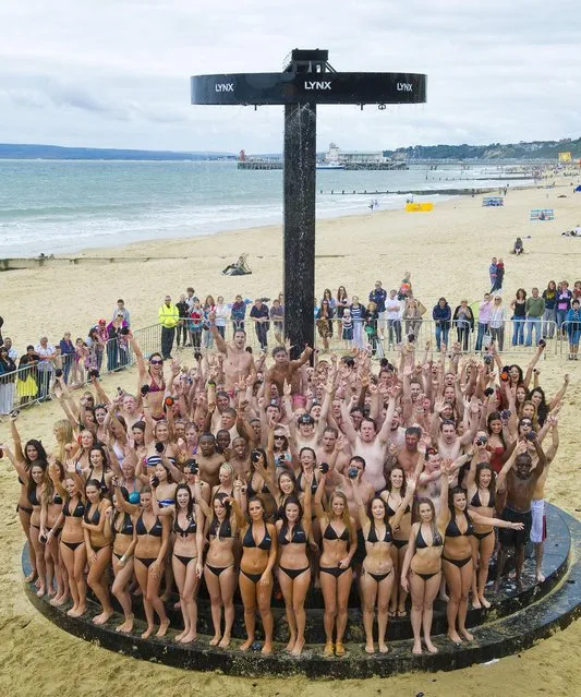 Lynx World Record for the most people showering together set on Bournemouth Beach on 13th August 2011. (Photo by Lynx UK/Guinness World Records)