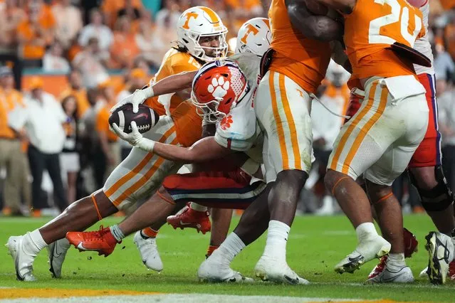 Clemson Tigers running back Will Shipley (1) reaches the ball into the end zone to convert on a two-point conversion against the Tennessee Volunteers during the second half of the 2022 Orange Bowl at Hard Rock Stadium in Miami Gardens, FL, USA on December 30, 2022. (Photo by Jasen Vinlove/USA TODAY Sports)
