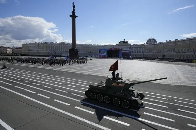 A World War II ages Soviet army T-34 tank rolls during a rehearsal for the Victory Day military parade which will take place at Dvortsovaya (Palace) Square on May 9 to celebrate 78 years after the victory in World War II in St. Petersburg, Russia, Sunday, May 7, 2023. (Photo by Dmitri Lovetsky/AP Photo)