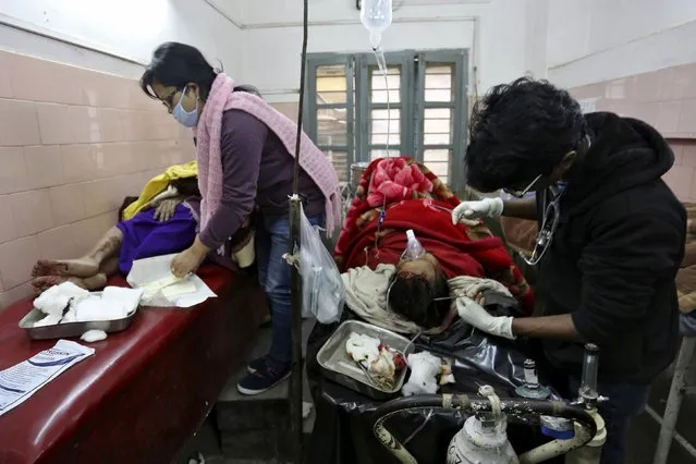 Medics tend to people who were injured after an earthquake, at a hospital in Imphal, India, January 4, 2016. (Photo by Reuters/Stringer)