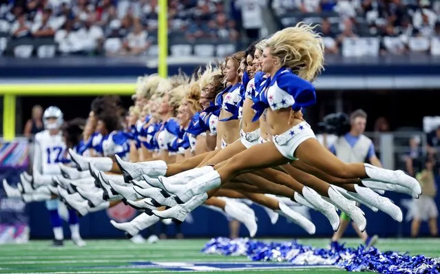 Dallas Cowboys cheerleaders perform before the game against the New England Patriots in Arlington, Texas on October 1, 2023. (Photo by Kevin Jairaj/USA Today Sports)