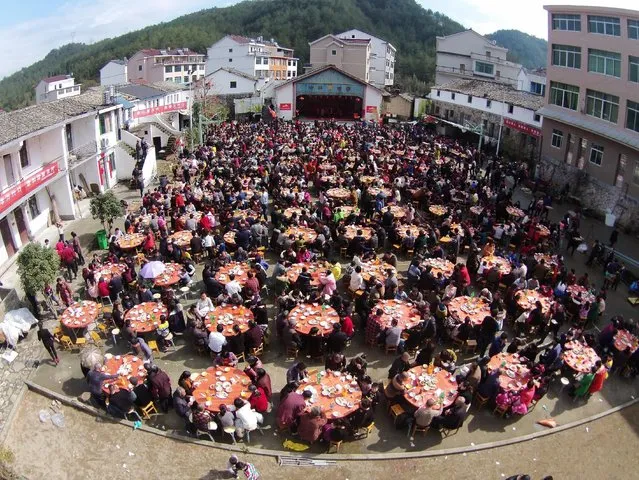 Villagers have lunch to celebrate the Spring Festival, in Taizhou, Zhejiang province, China February 11, 2016. (Photo by Reuters/Stringer)