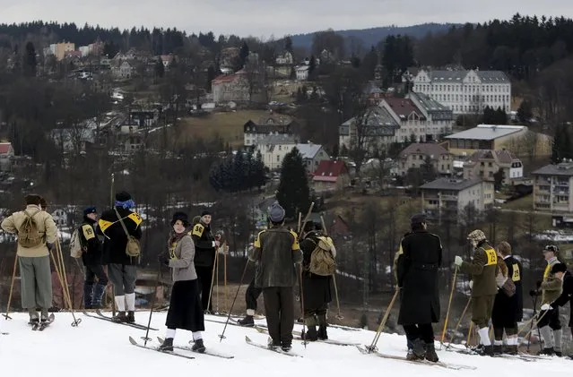 Participants wearing vintage attire prepare for a traditional historical ski race in the northern Bohemian town of Smrzovka, Czech Republic, February 20, 2016. (Photo by David W. Cerny/Reuters)