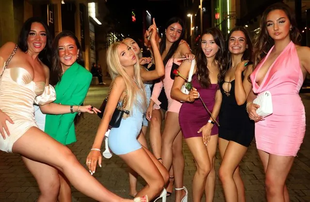 Young women posed for photos as they hit the town in Leeds, United Kingdom on September 25, 2021. Hordes of booze-fuelled youngsters poured into pubs and clubs on Saturday night  before hitting the books when uni starts. (Photo by Nb press ltd)