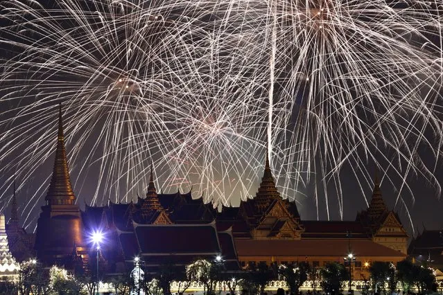 Fireworks explode over the Grand Palace during the New Year celebrations, in Bangkok, Thailand on January 1, 2024. (Photo by Athit Perawongmetha/Reuters)