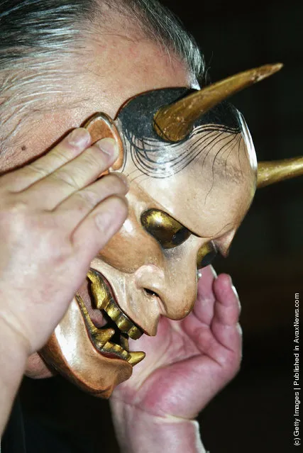 A renowned Noh actor, Otoshige Sakai, demostrates how to put on a Noh mask