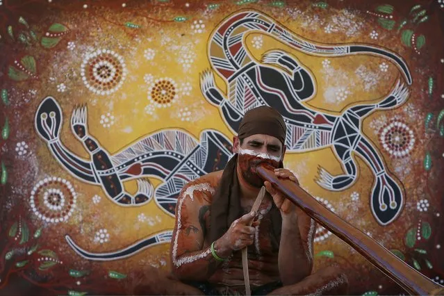 Coedie McAvoy of the Wangan and Jagalingou people performs during an anti-Adani rally at the Clermont Showground on April 28, 2019 in Clermont, Australia. Former Greens leader and conservationist, Bob Brown, has been leading a convoy of environmental activists through the Southern States towards Central Queensland as part of the #StopAdani movement. With primary concerns for increased coal ship travel through the Great Barrier Reef World Heritage Area, unlocking of the Galilee Basin and increase in carbon pollution. The proposed Adani Carmichael Mine, if approved will be constructed in the North Galilee Basin, 160kms north-west of regional town Clermont, its first stage is estimated to produce 27.5 million tonnes of coal per annum and will be transported via rail to Abbot Point which is situated 25km north of Bowen. (Photo by Lisa Maree Williams/Getty Images)