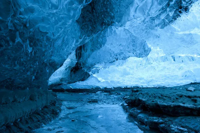 A wide blue view of the crystal ice cave in the Vatnajokull Glacier, Iceland. (Photo by Rob Lott/Barcroft Media)