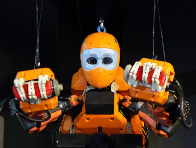 French officials unveil “Ocean One” an underwater diving robot at the history museum in Marseille, southern France, Thursday, April 28, 2016. French officials have unveiled a humanoid diving robot which they hope will give a big artificial hand to the practice of underwater archeology. (Photo by Claude Paris/AP Photo)